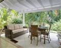 Enjoy a glass of wine at Bluff Cottage; Barbados; Caribbean
