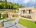 Enjoy a glass of wine at Villa Aquamarine; Sivota; Greece