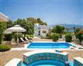 Enjoy a glass of wine at Villa Calantha; Crete; Greece