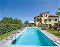 Enjoy a glass of wine at Villa Casa Lorenza; Cortona; Tuscany