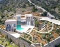 Enjoy a glass of wine at Villa Elounda; Crete; Greece
