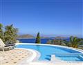 Enjoy a glass of wine at Villa Liakada; Crete; Greece