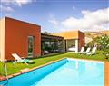 Enjoy a glass of wine at Villa Panthea; Salobre Golf Resort; Spain