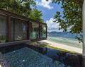 Enjoy a glass of wine at 1-Bedroom Beach Access Pool Villa; The Naka; Thailand