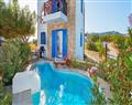 Enjoy a glass of wine at Blue Sea Villa; Gennadi; Rhodes