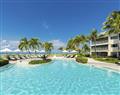 Enjoy a glass of wine at Deluxe Christa Suite; Turks and Caicos; Caribbean
