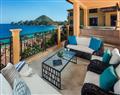 Enjoy a glass of wine at Penthouse Dia Pacifico; Cabo San Lucas; Mexico
