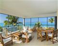 Enjoy a glass of wine at Premium Oceanfront Suite; Turks and Caicos; Caribbean