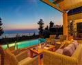 Enjoy a glass of wine at Rosepetra; Northern Kefalonia; Greece