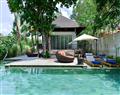 Enjoy a glass of wine at Villa Abaddon; Layana Resort; Thailand
