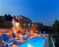 Enjoy a glass of wine at Villa Charlottes Sky; Trogir; Dalmatia
