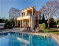 Enjoy a glass of wine at Villa Coral Cipriana; Latchi; Cyprus