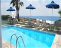 Enjoy a glass of wine at Villa Coral Sapphire; Coral Bay; Paphos
