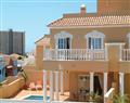 Enjoy a glass of wine at Villa Cush; Playa Paraiso, Tenerife; The Canary Islands