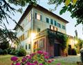Enjoy a glass of wine at Villa Emma; Tuscany; Italy