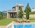Enjoy a glass of wine at Villa Niso; Spanochori; Lefkas