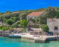 Enjoy a glass of wine at Villa Pietra Pag; Dalmatian Islands; Croatia