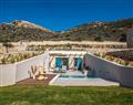 Enjoy a glass of wine at Villa Pyrite; Crete; Greece