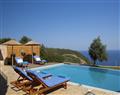Enjoy a glass of wine at Villa Spiaggia; Lefkas; Greece
