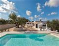 Enjoy a glass of wine at Villa Vignale; Noci, Noci & Putignano, Puglia; Italy