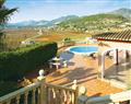 Enjoy a glass of wine at Villa Vista; Jalon Valley, Costa Blanca; Spain